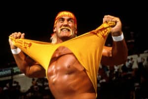 A photo of professional wrestler Hulk Hogan ripping his iconic red and yellow t-shirt.